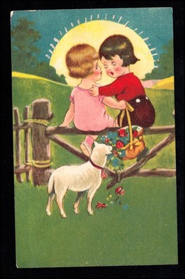 Children on electric fence, lamb eats the flowers from the basket, Düren 1.3.1930