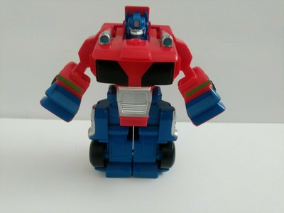 playskool heroes transformers rescue bots optimus prime racing trailer