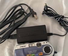 CAMERA DOES NOT WORK I'm selling the cords for it Sony Cyber Shot