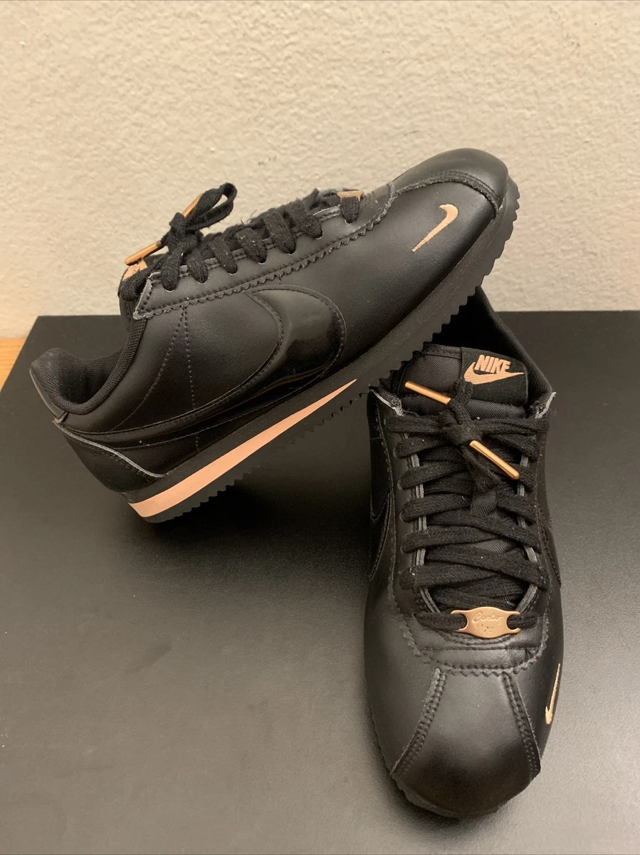 Nike Cortez trainers in black and rose gold