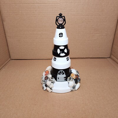 Handmade Black and White Lighthouse Decoration With Seashells Gathered Off Coast