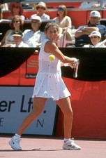 Monica Seles of Yugoslavia hits a return at a women's singles matc- Old Photo 4