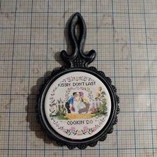 Vintage Cast Iron Trivet “Kissin Don’t Last, Cookin Do” Humor Kitchen 4.5"