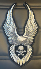 EAGLE HOLDING A SKULL WITH LARGE WINGS LARGE ...