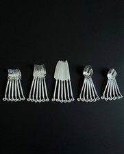 Ensemble ménagère de 30 couverts en inox - forme spirales / tourbillons - servic