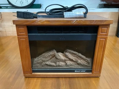 Heat Surge Electric Fireplace 120V/60Hz, 1200W USED - Image 1 of 4