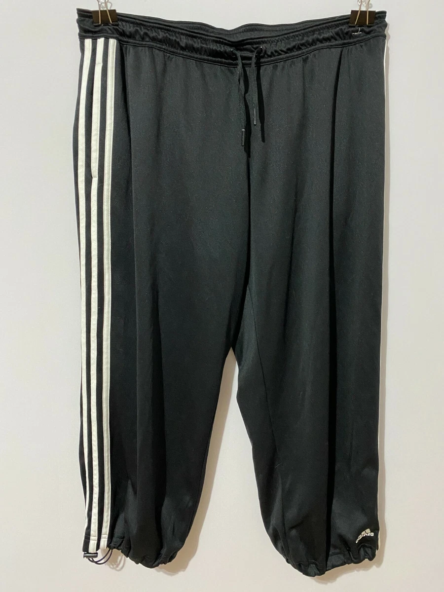 Adidas womens active black capri pants, white stripes on sides