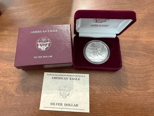 BU 1990 U.S. American Silver Eagle in original Mint packaging.