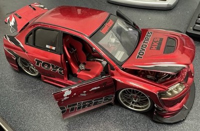 Jada Toys Import Racer 1:18 Scale Red Mitsubishi Lancer Evolution
