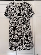 Ann Taylor animal print dress, size 2 Black with taupe behind each spot.