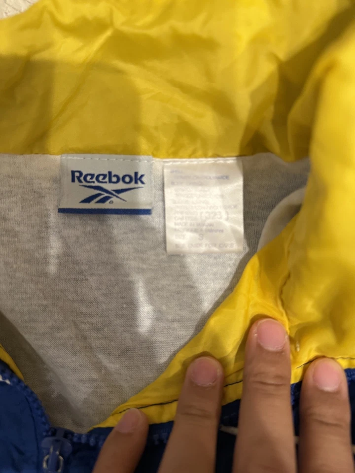 Chaqueta cortavientos vintage Reebok para mujer S azul amarillo traje de pista cremallera completa años 90 Foto 3 de 4