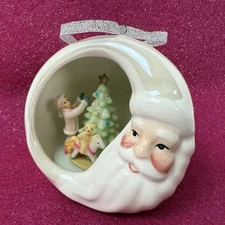Appletree Design - Porcelain Christmas Santa Ornament - Child Decorating Tree