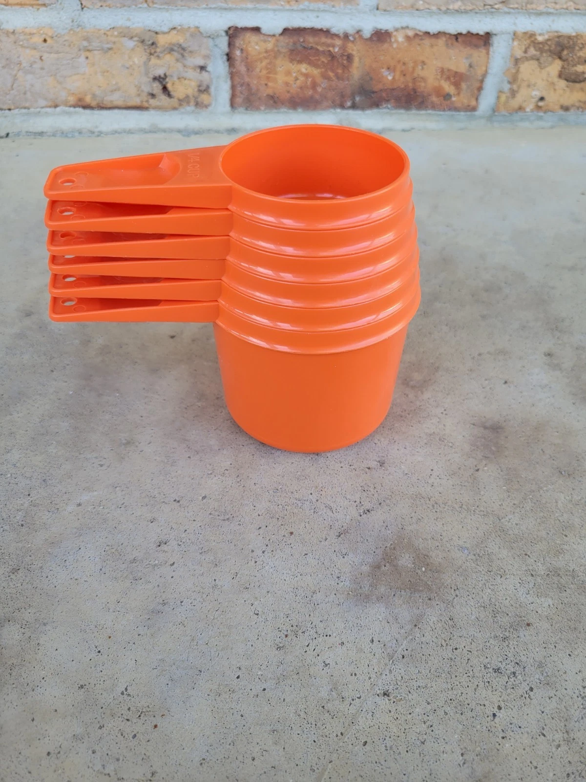 Vintage TUPPERWARE Orange Graduated Measuring Cups 6pc Set 1/4 to 1 cup
Opens in a new window or tab