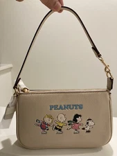 NWT Coach CE858 X Peanuts Nolita 19 With Snoopy And Friends Motif Ivory Multi