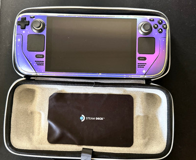 512gb LCD steam deck with a 1tb SD card, charger, case and dock 