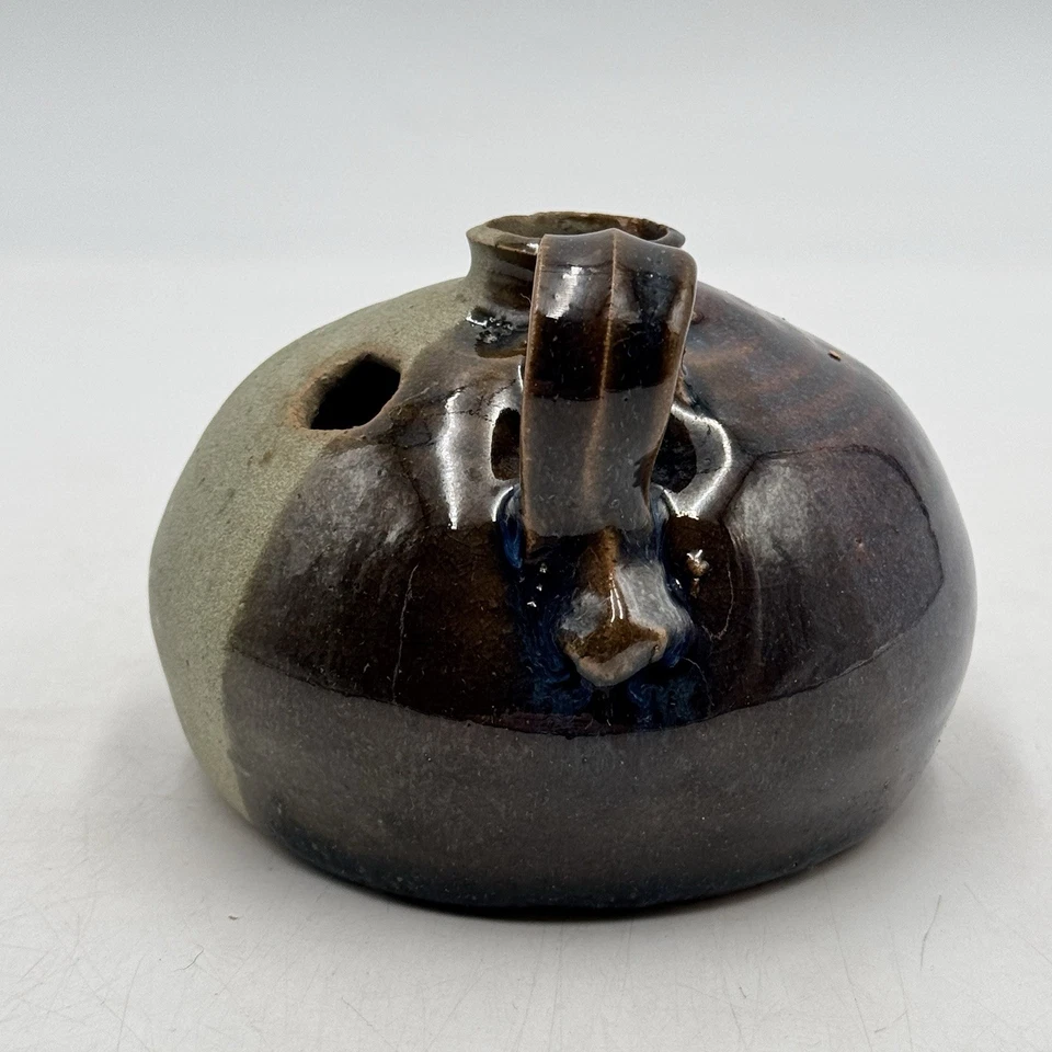 Candelabro en forma de jarra de gres de cerámica artística candelabro marrón lazo para dedos Foto 3 de 4