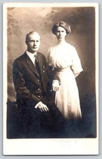 Couple in Formal Attire – Resberger’s Studio c.1900s