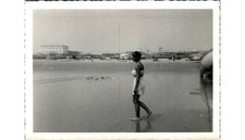 1940s Beach Photograph: Woman's High-Waisted Swimsuit  Coastal Resort Scene