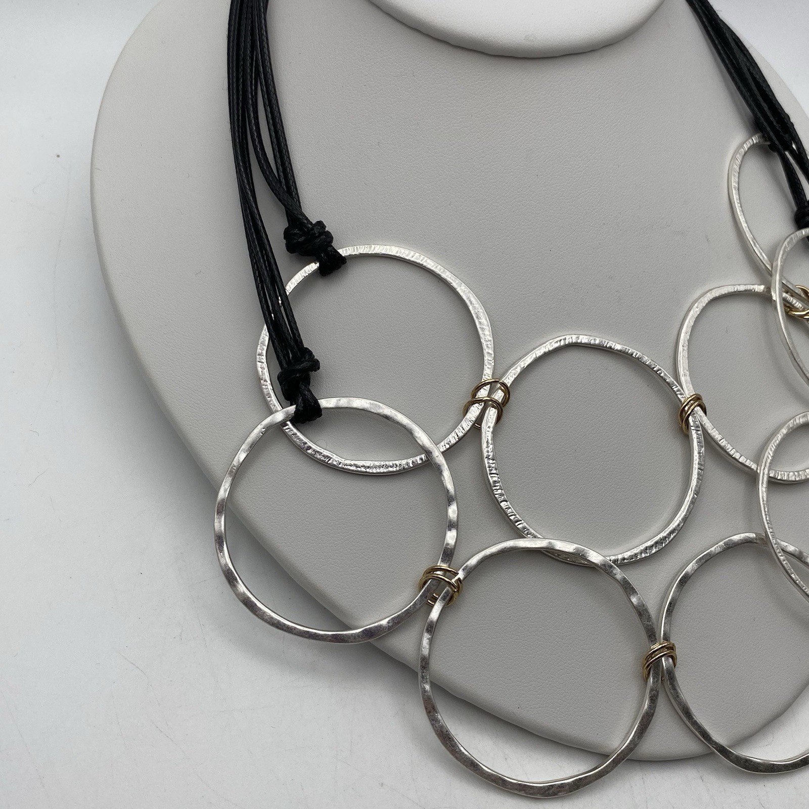 Bold Silver Tone Hammered Interlocking Rings Stat… - image 2