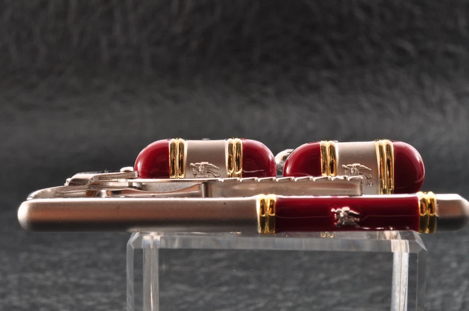 Near mint "Burberry" cufflinks and tie clip silver and red color with brand box. - Image 3 of 4