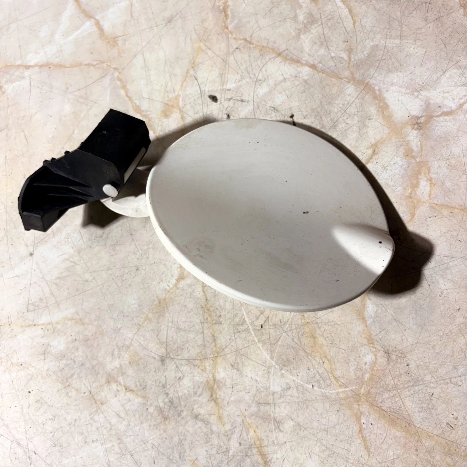 Used white Fiat 500 fuel flap exterior face