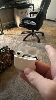 One Apple AirPods (3rd Generation) with a Lightning or MagSafe charging case
