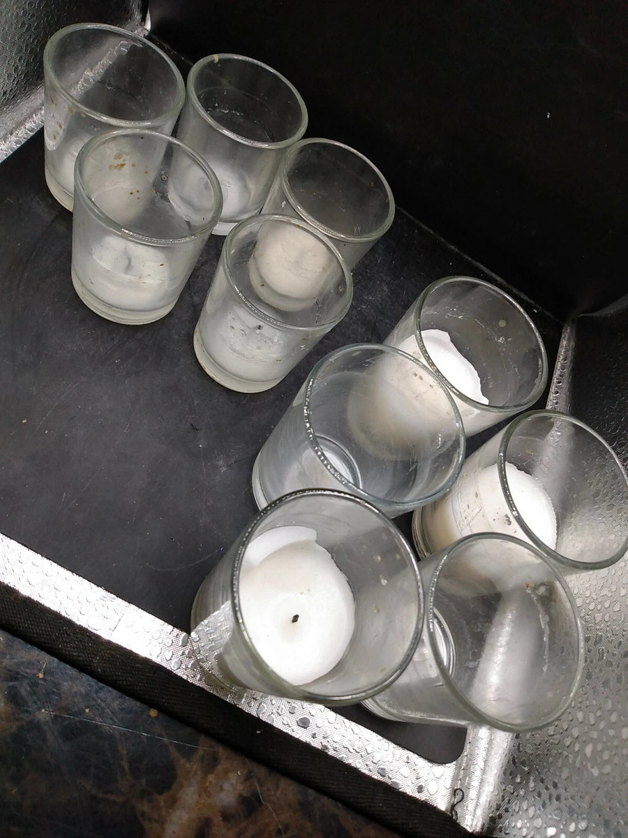 10 small glass candle holders. AD