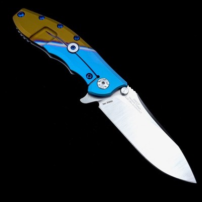 Zero Tolerance 0562CF Flipper Rick Hinderer Plain Edge Rainbolt ZT 0562