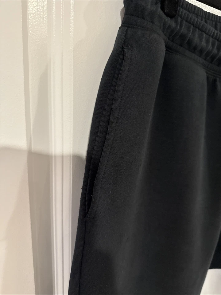 Pantalones de lana Nike Sportswear Swoosh para hombre talla mediana DR9032-010 negros grandes Swoosh Foto 3 de 4