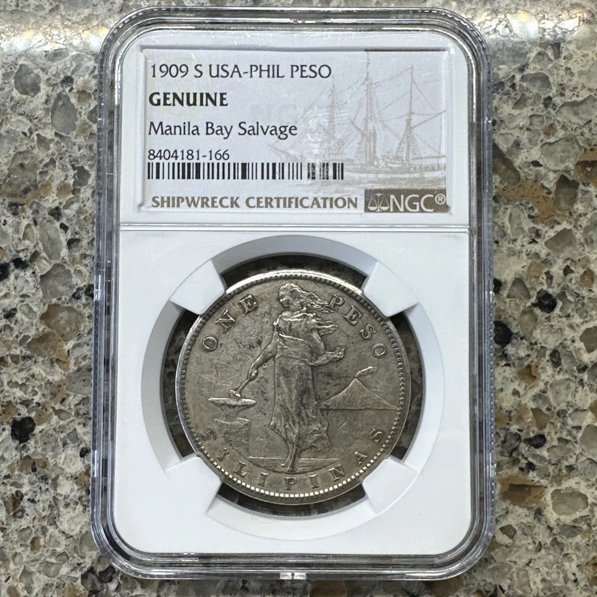 1909-S USA-Philippines One Peso NGC Genuine Manila Bay Salvage