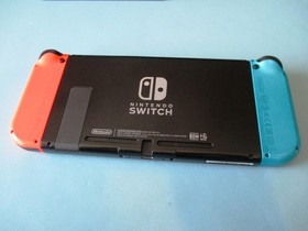 Nintendo Switch System Console w/Neon Red & Blue Joy-Cons + Dock & Extras