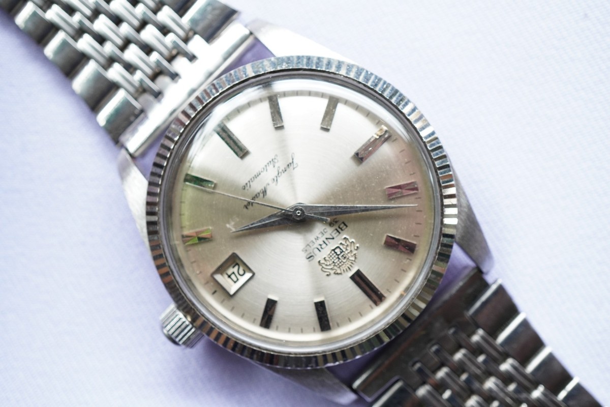 RARE BENRUS 39 J FLUTED BEZEL JUNGLE MASTER GOLDPLATED COIN BACK