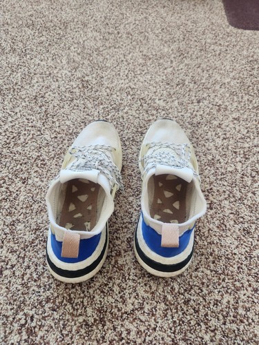 die marke mit den 3 streifen white