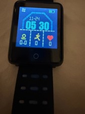 Black Smartwatch with Silicone Band and Touchscreen Display