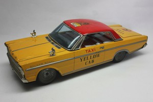 yellow taxi toy car