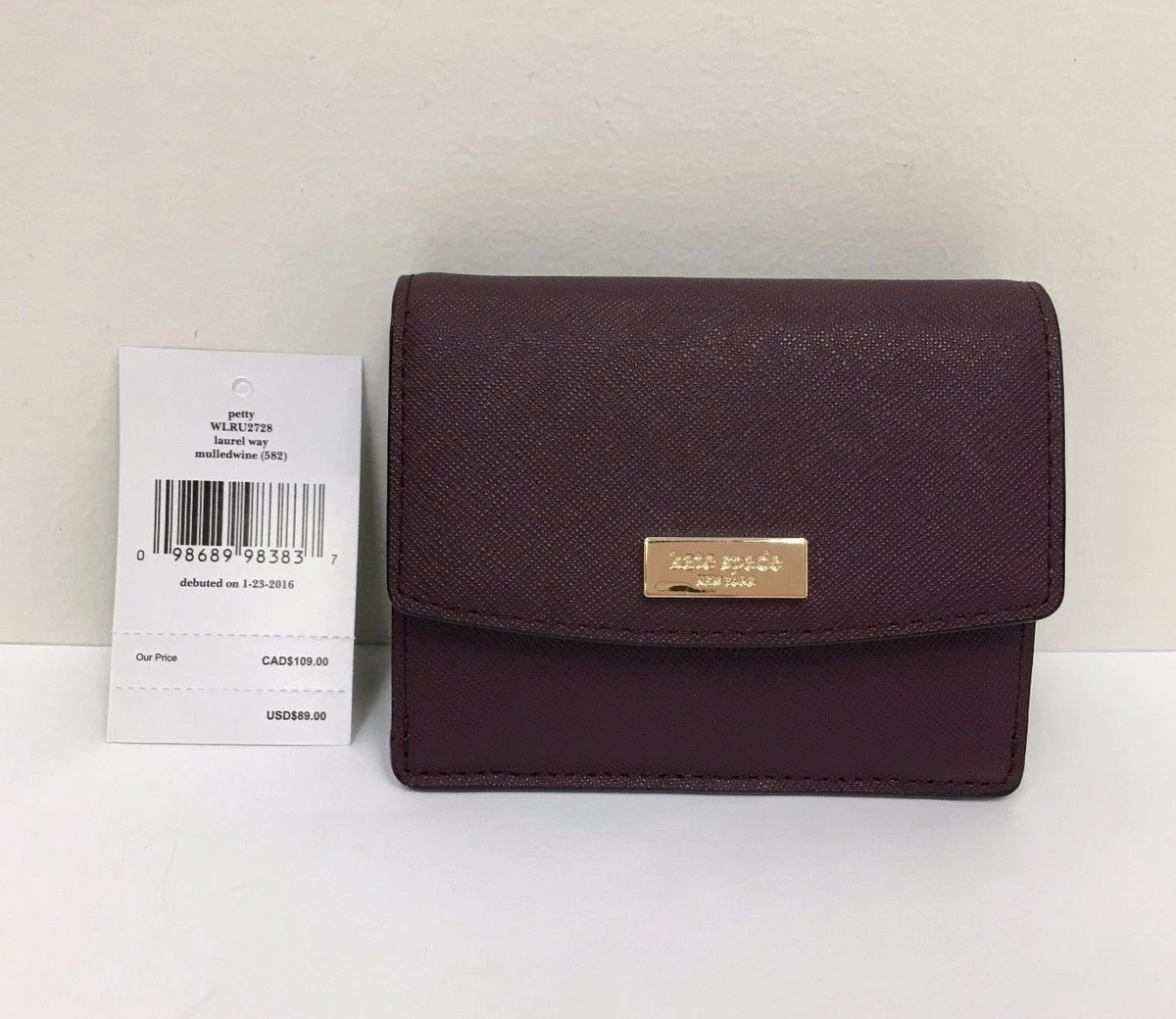 Kate spade petty laurel way wallet hot sale