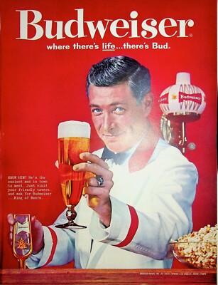 Original Budweiser Ad: Man in white coat is showing Budweiser