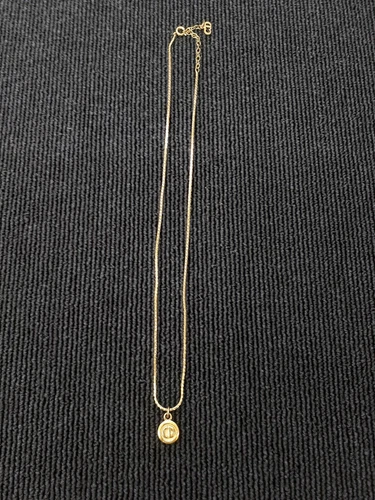 Collier CHRISTIAN DIOR en or du Japon