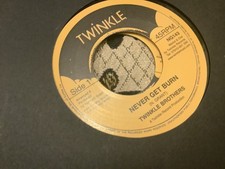 Twinkle Brothers , Never Get Burn   , 7”Twinkle.
