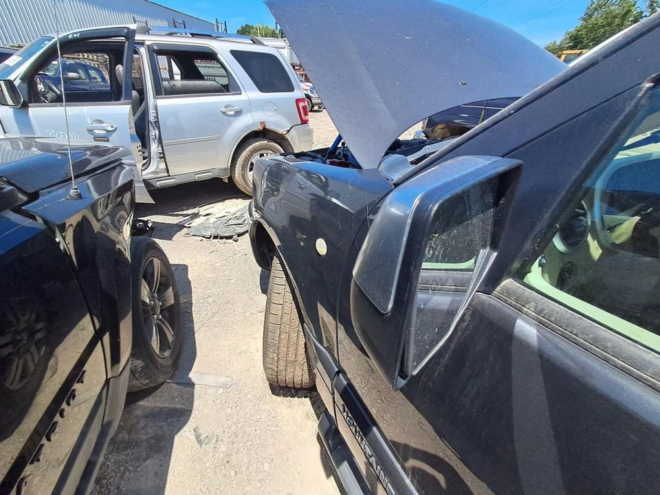 Espejo retrovisor lateral del conductor Mercury Mountaineer 2007 OEM eléctrico plegable gris 3614967 Foto 3 de 3