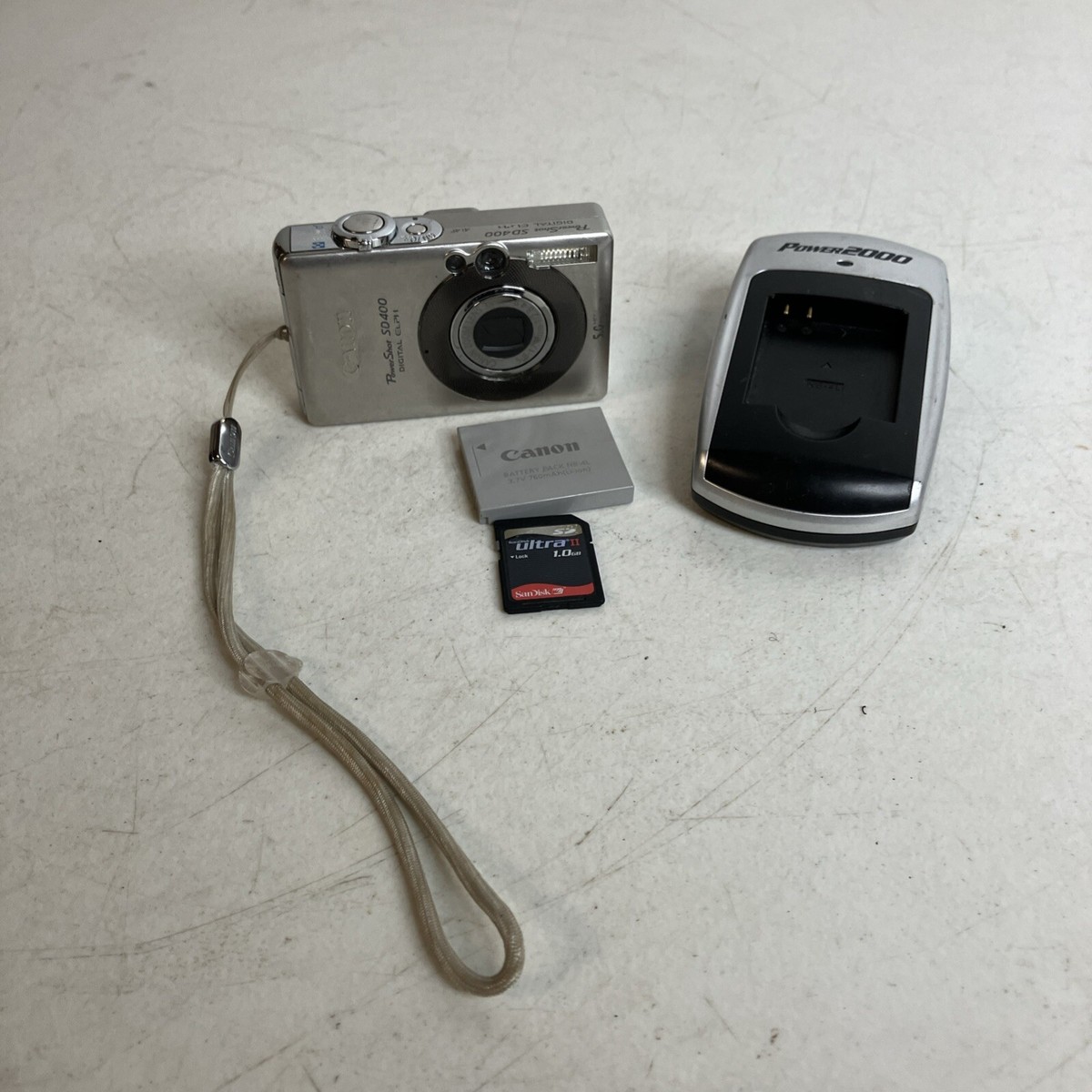 Canon PowerShot SD400 Digital Camera PC1150 With Charger & Manual