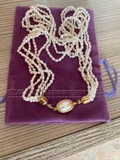 Collana in perle "scaramazze" con chiusure in argento placcato Oro Giallo.