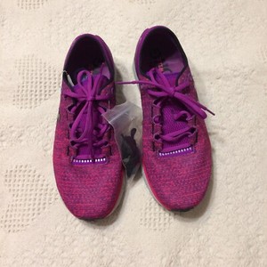 black and purple under armour shoes