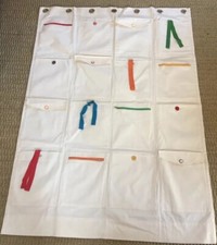 Pottery Barn Kids Hanging Organizer Off-White w/ Multicolor Ties Zippers Buttons