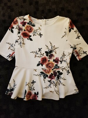 cream peplum top