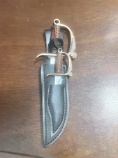 Mini handheld sword set. Features small and Large miniature handheld swords.