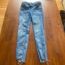 Free People High Rise Stretch Skinny Jeans. Distressed hems. Size 25R.