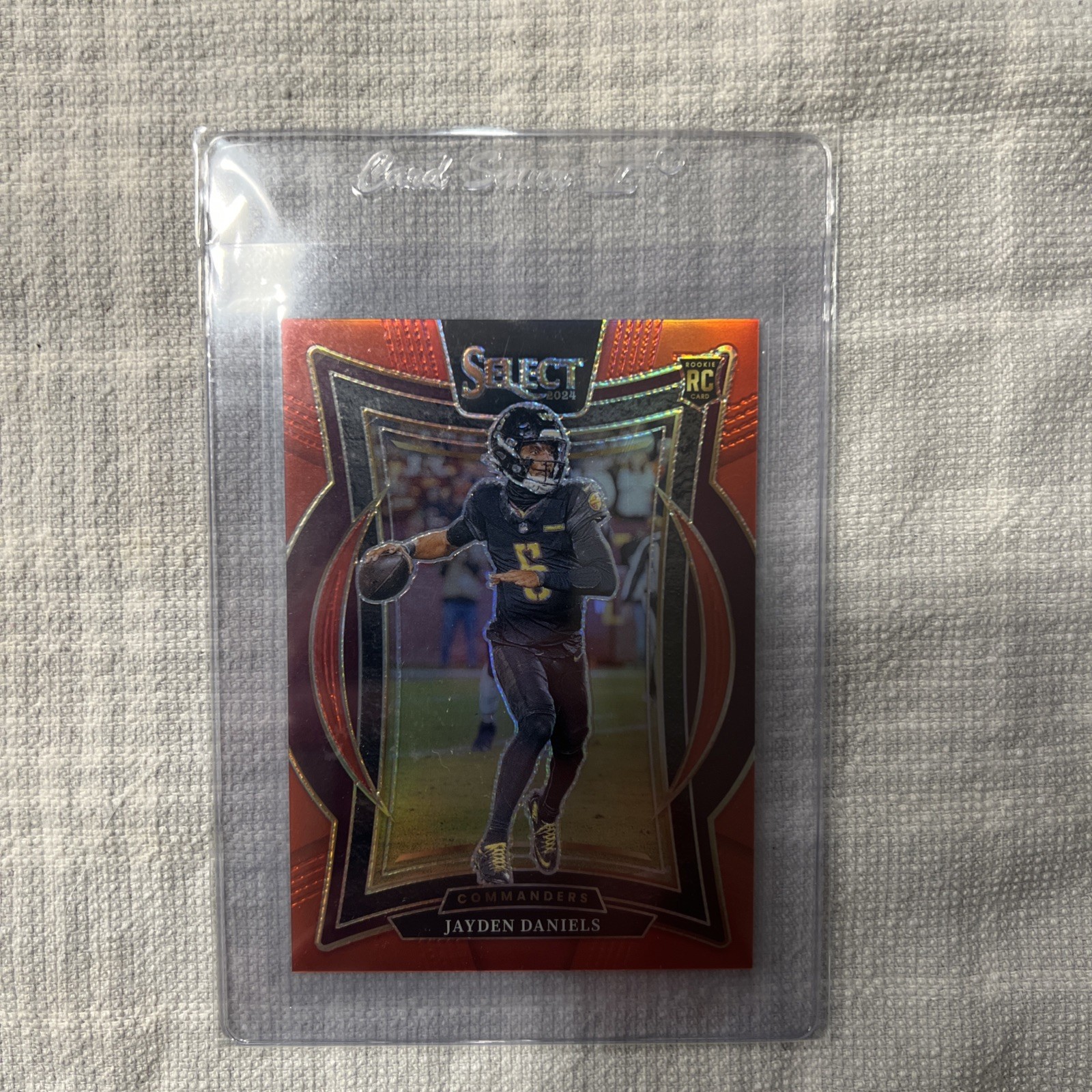 2024 Panini Select - Concourse Jayden Daniels #26 Red Prizm /99 (RC)