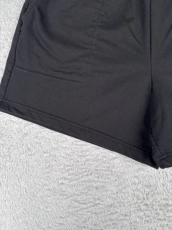 Pantalones Cortos The North Face Mujer Pequeños Negros Cintura Elástica Tela de Terry Francés Algodón Foto 3 de 4