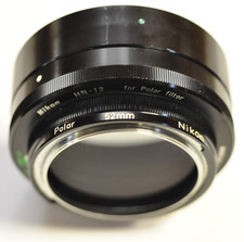 Nikon HN-12 metal thread-in hood and Nikon 52mm Polarizer.
